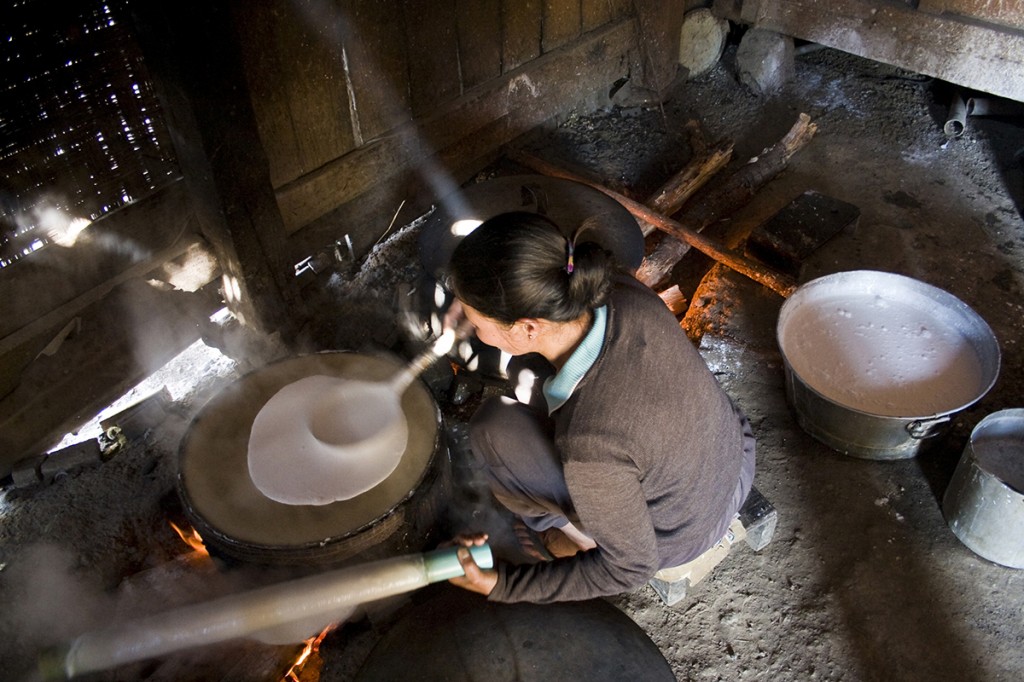 Smoothing out the watery rice noodle paste